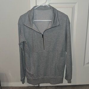 Grey 1/4 zip pullover.